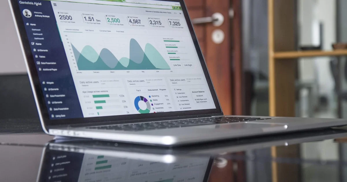 Business growth line chart on a laptop screen